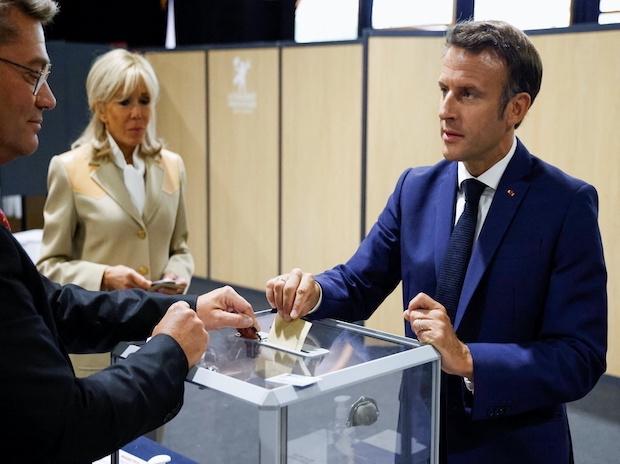 France’s Macron battles for control of parliament after first round of voting