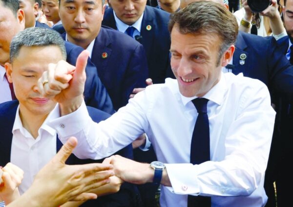 Macron mobbed at university on final day of China trip